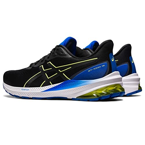 Black and blue ASICS GT-1000 running shoes with yellow accents