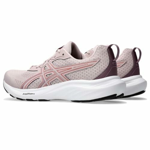 Side view of pink Asics running shoes with white soles.