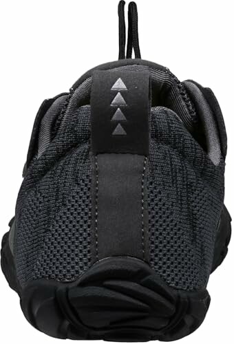 Back view of a black athletic shoe with mesh fabric and arrow design