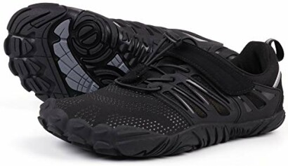 Black minimalist barefoot running shoes with unique sole design.