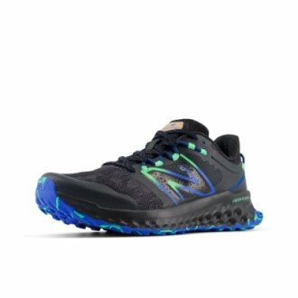 Black and blue running shoe with green accents.