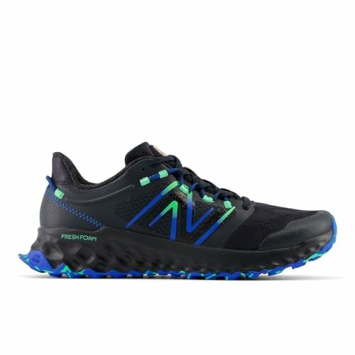 Black and blue running shoe with green accents.