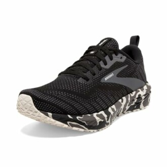 Black running shoe with camo-patterned sole.