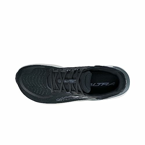 Top view of a black running shoe with mesh material and laces.