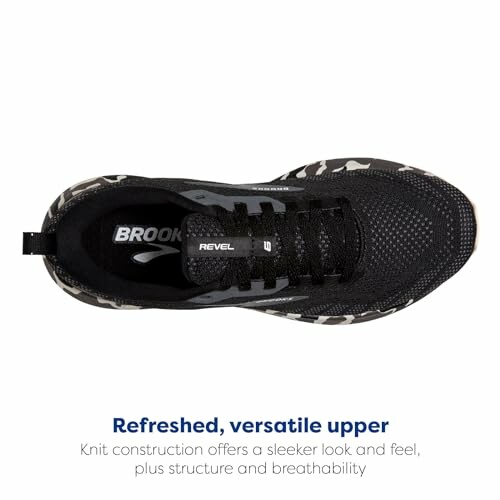 Top view of black running shoe with knit construction and branding.