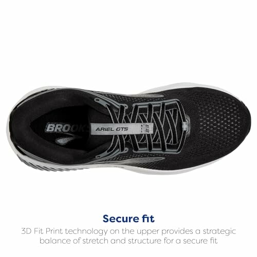 Top view of a black running shoe with secure fit label.