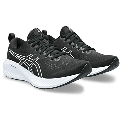 Pair of black Asics running shoes with white soles.