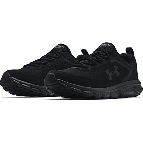 Black athletic running shoes with logo, showcasing Under Armour Men's Charged Assert 9.