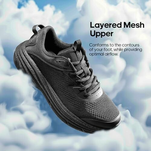 Black sneaker with layered mesh upper floating on clouds.