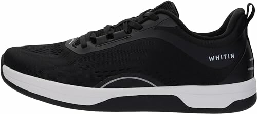 Black sneaker with white sole, side view