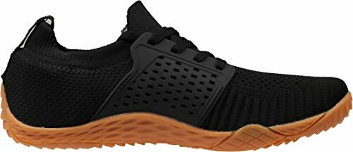 Black sports shoe with orange sole