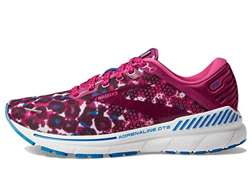 Pink Brooks Adrenaline GTS running shoe with blue accents.