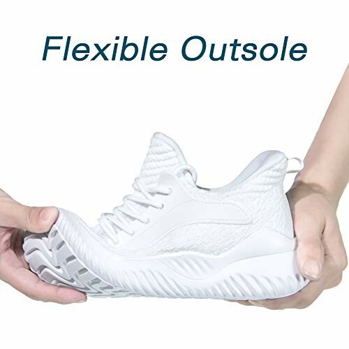 Hands bending a white shoe with a flexible outsole.