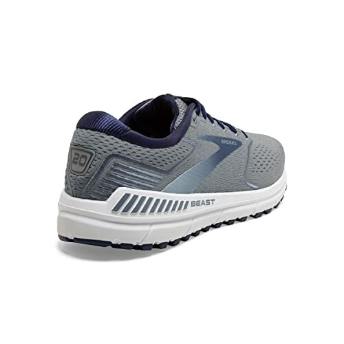 Gray running shoe with white sole and blue accents