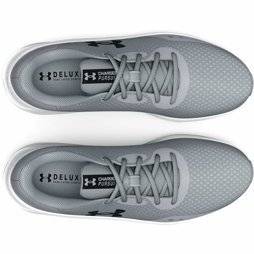 Top view of gray running shoes with laces.