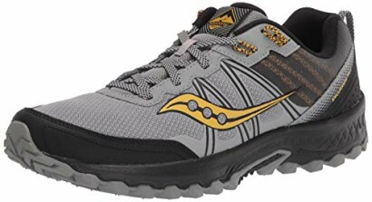 Grey and black trail running shoe with yellow accents.