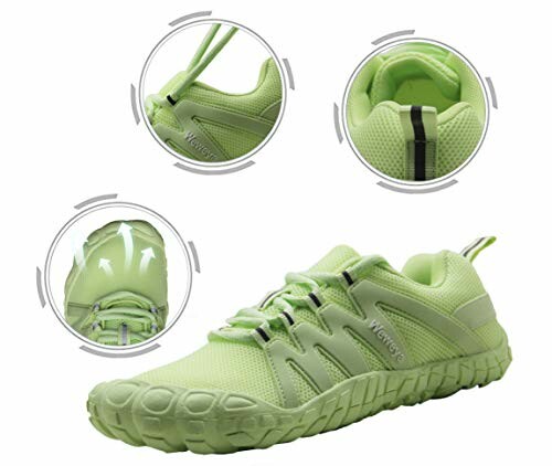 Light green athletic shoes with close-up details.