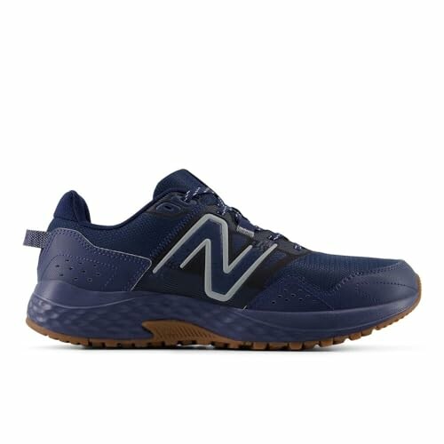 Navy blue running shoe with gum sole