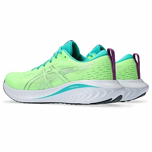 Neon green running shoes with white soles and teal accents.