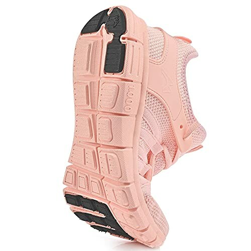 Pink running shoe sole with detailed tread pattern