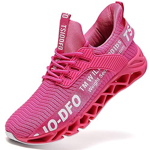 Pink sports sneaker with unique sole design