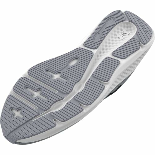 Running shoe sole with gray and white tread pattern