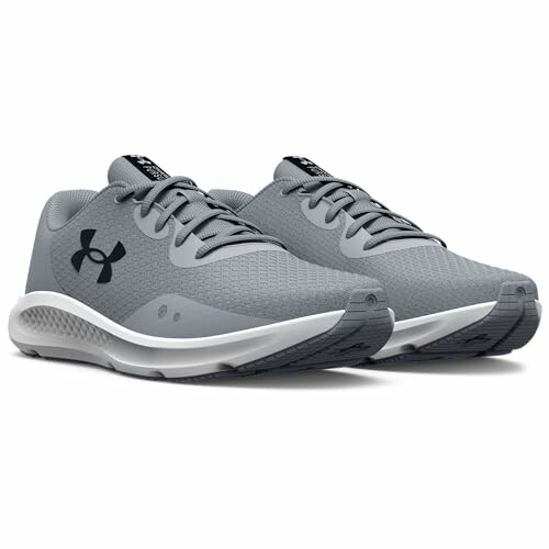 Gray Under Armour sneakers with logo