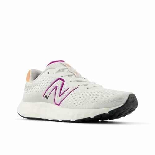 White running shoe with purple accents